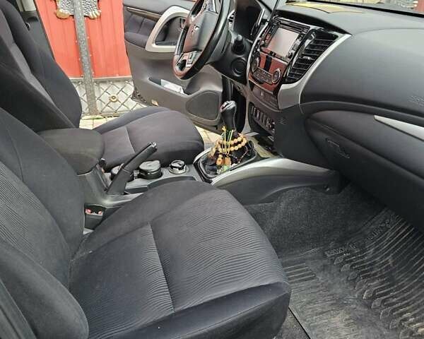 Чорний Міцубісі Паджеро Спорт, об'ємом двигуна 2.44 л та пробігом 96 тис. км за 21000 $, фото 13 на Automoto.ua