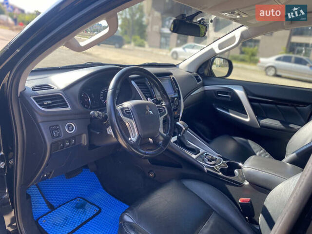 Черный Мицубиси Паджеро Спорт, объемом двигателя 2.44 л и пробегом 144 тыс. км за 28000 $, фото 4 на Automoto.ua