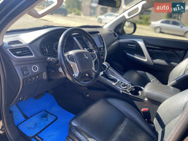 Черный Мицубиси Паджеро Спорт, объемом двигателя 2.44 л и пробегом 144 тыс. км за 28000 $, фото 5 на Automoto.ua