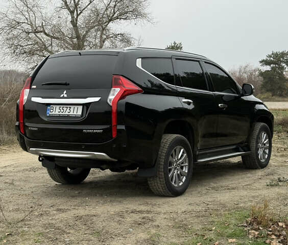 Чорний Міцубісі Паджеро Спорт, об'ємом двигуна 2.44 л та пробігом 96 тис. км за 28799 $, фото 10 на Automoto.ua