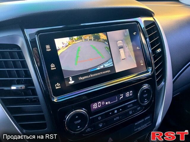 Черный Мицубиси Паджеро Спорт, объемом двигателя 2.4 л и пробегом 143 тыс. км за 27700 $, фото 9 на Automoto.ua