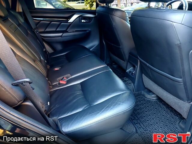 Черный Мицубиси Паджеро Спорт, объемом двигателя 2.4 л и пробегом 143 тыс. км за 27700 $, фото 7 на Automoto.ua