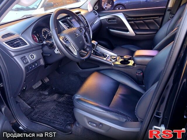 Черный Мицубиси Паджеро Спорт, объемом двигателя 2.4 л и пробегом 143 тыс. км за 27700 $, фото 6 на Automoto.ua