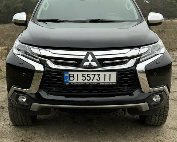 Чорний Міцубісі Паджеро Спорт, об'ємом двигуна 2.44 л та пробігом 96 тис. км за 28799 $, фото 1 на Automoto.ua