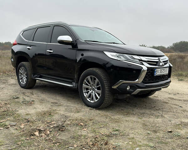 Чорний Міцубісі Паджеро Спорт, об'ємом двигуна 2.44 л та пробігом 96 тис. км за 28799 $, фото 7 на Automoto.ua