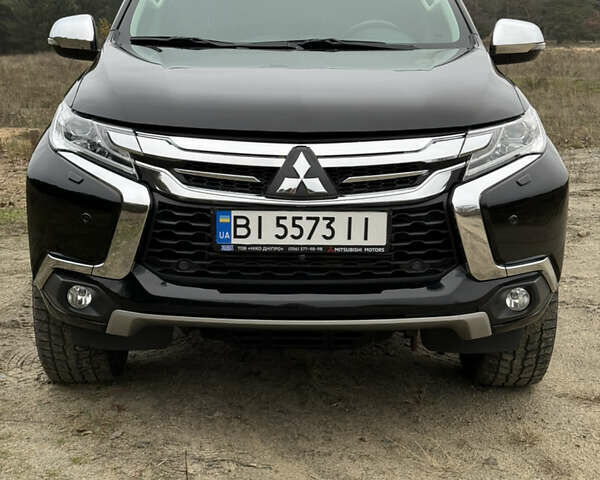 Чорний Міцубісі Паджеро Спорт, об'ємом двигуна 2.44 л та пробігом 96 тис. км за 28799 $, фото 2 на Automoto.ua