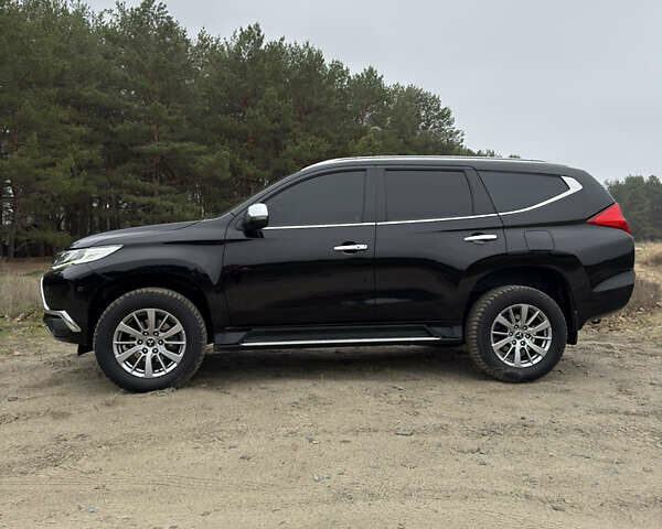 Чорний Міцубісі Паджеро Спорт, об'ємом двигуна 2.44 л та пробігом 96 тис. км за 28799 $, фото 25 на Automoto.ua