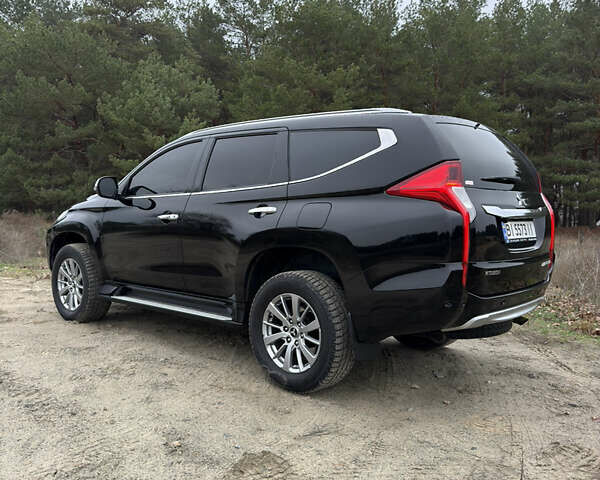 Чорний Міцубісі Паджеро Спорт, об'ємом двигуна 2.44 л та пробігом 96 тис. км за 28799 $, фото 19 на Automoto.ua