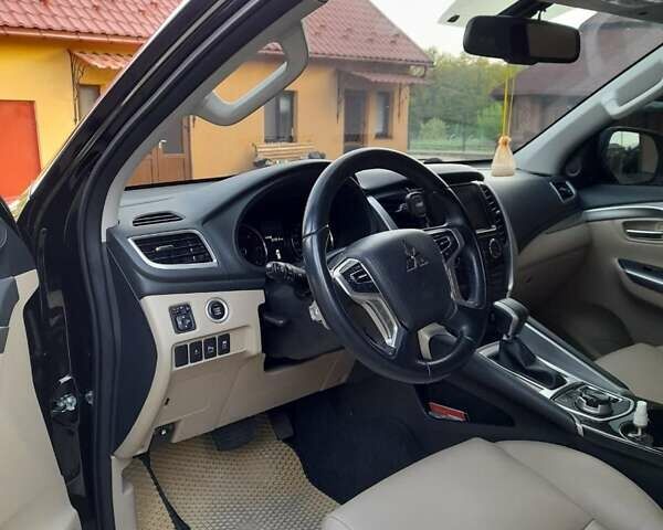 Чорний Міцубісі Паджеро Спорт, об'ємом двигуна 2.44 л та пробігом 140 тис. км за 30500 $, фото 1 на Automoto.ua