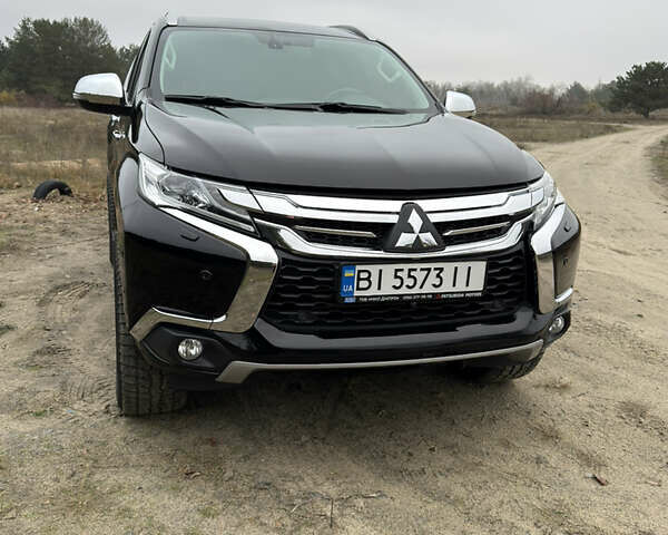 Чорний Міцубісі Паджеро Спорт, об'ємом двигуна 2.44 л та пробігом 96 тис. км за 28799 $, фото 5 на Automoto.ua