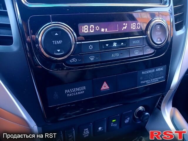 Черный Мицубиси Паджеро Спорт, объемом двигателя 2.4 л и пробегом 143 тыс. км за 27700 $, фото 13 на Automoto.ua