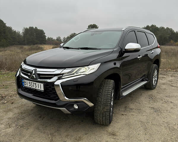 Чорний Міцубісі Паджеро Спорт, об'ємом двигуна 2.44 л та пробігом 96 тис. км за 28799 $, фото 4 на Automoto.ua