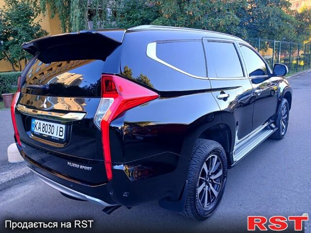 Черный Мицубиси Паджеро Спорт, объемом двигателя 2.4 л и пробегом 143 тыс. км за 27700 $, фото 3 на Automoto.ua