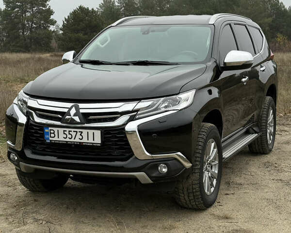 Чорний Міцубісі Паджеро Спорт, об'ємом двигуна 2.44 л та пробігом 96 тис. км за 28799 $, фото 3 на Automoto.ua