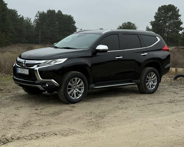 Чорний Міцубісі Паджеро Спорт, об'ємом двигуна 2.44 л та пробігом 96 тис. км за 28799 $, фото 18 на Automoto.ua