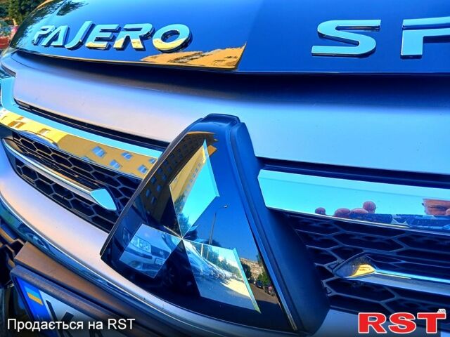 Черный Мицубиси Паджеро Спорт, объемом двигателя 2.4 л и пробегом 143 тыс. км за 27700 $, фото 2 на Automoto.ua