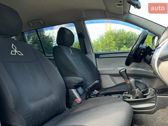 Коричневый Мицубиси Паджеро Спорт, объемом двигателя 2.5 л и пробегом 197 тыс. км за 15800 $, фото 8 на Automoto.ua