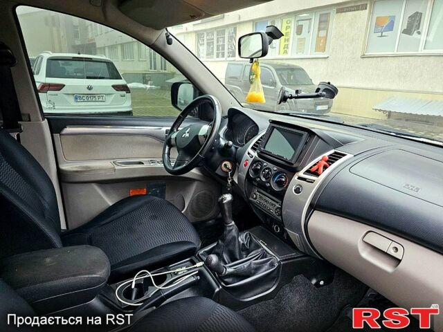 Коричневий Міцубісі Паджеро Спорт, об'ємом двигуна 2.5 л та пробігом 395 тис. км за 14000 $, фото 10 на Automoto.ua