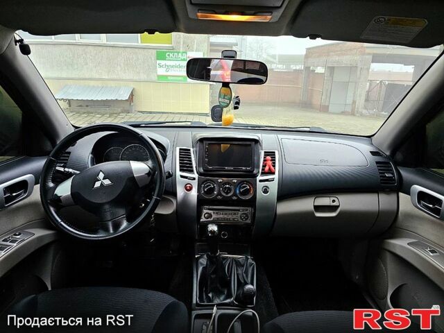 Коричневий Міцубісі Паджеро Спорт, об'ємом двигуна 2.5 л та пробігом 395 тис. км за 14000 $, фото 8 на Automoto.ua