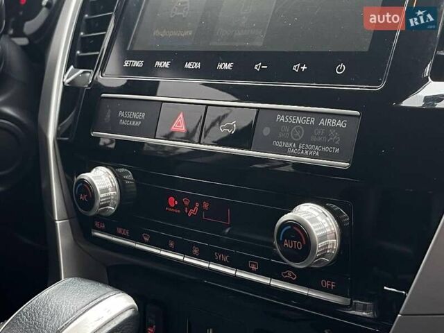 Коричневий Міцубісі Паджеро Спорт, об'ємом двигуна 2.44 л та пробігом 131 тис. км за 34499 $, фото 30 на Automoto.ua