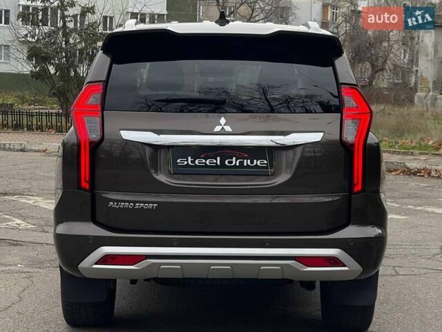 Коричневий Міцубісі Паджеро Спорт, об'ємом двигуна 2.44 л та пробігом 131 тис. км за 34499 $, фото 5 на Automoto.ua