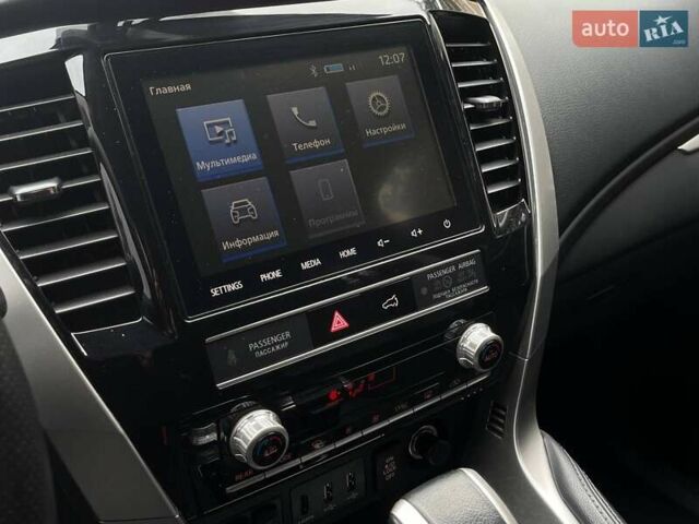 Коричневий Міцубісі Паджеро Спорт, об'ємом двигуна 2.44 л та пробігом 131 тис. км за 34499 $, фото 28 на Automoto.ua