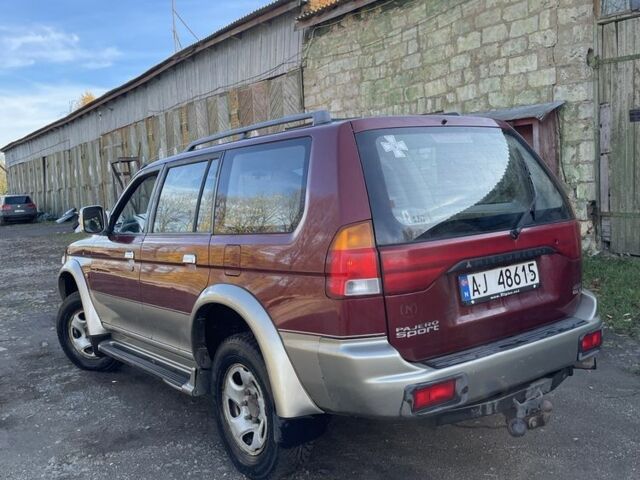 Червоний Міцубісі Паджеро Спорт, об'ємом двигуна 3 л та пробігом 350 тис. км за 3500 $, фото 4 на Automoto.ua