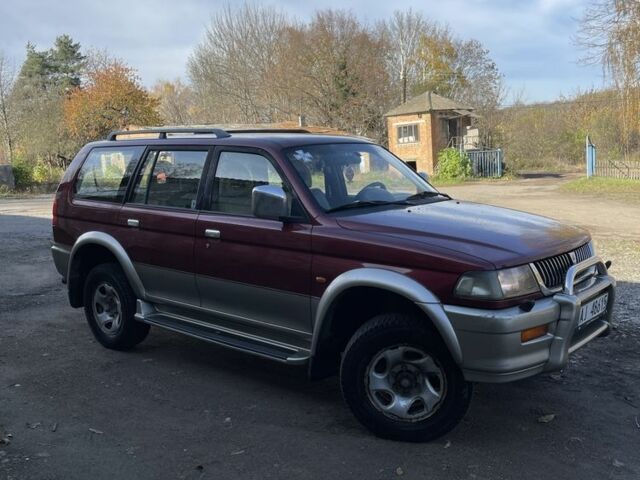 Червоний Міцубісі Паджеро Спорт, об'ємом двигуна 3 л та пробігом 350 тис. км за 3500 $, фото 1 на Automoto.ua