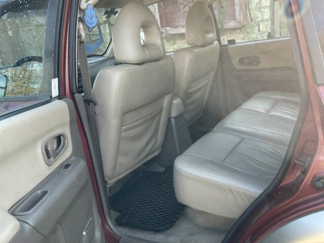 Червоний Міцубісі Паджеро Спорт, об'ємом двигуна 3 л та пробігом 350 тис. км за 3500 $, фото 5 на Automoto.ua