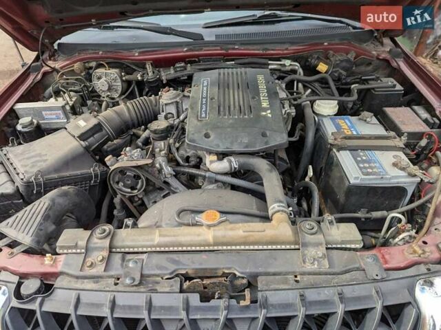 Мицубиси Паджеро Спорт 2000 в Чернигове на Automoto.ua Красный Мицубиси Паджеро Спорт, объемом двигателя 2.97 л и пробегом 311 тыс. км за 5700 $, фото 4 на Automoto.ua