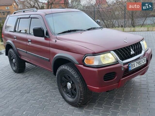 Красный Мицубиси Паджеро Спорт, объемом двигателя 3 л и пробегом 155 тыс. км за 5777 $, фото 12 на Automoto.ua