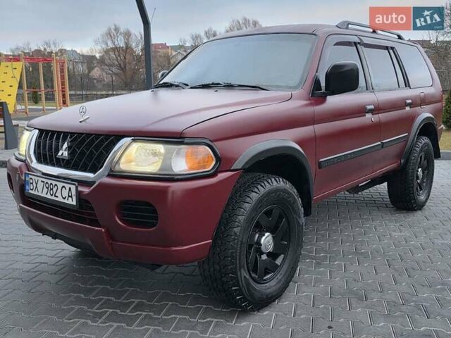 Красный Мицубиси Паджеро Спорт, объемом двигателя 3 л и пробегом 155 тыс. км за 5777 $, фото 5 на Automoto.ua