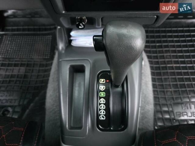 Красный Мицубиси Паджеро Спорт, объемом двигателя 3 л и пробегом 155 тыс. км за 5777 $, фото 49 на Automoto.ua