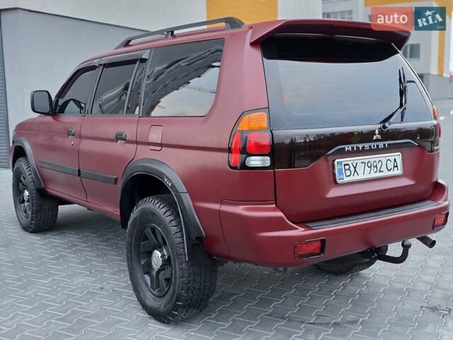 Красный Мицубиси Паджеро Спорт, объемом двигателя 3 л и пробегом 155 тыс. км за 5777 $, фото 2 на Automoto.ua