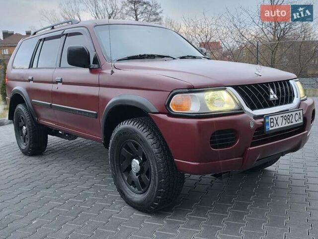 Красный Мицубиси Паджеро Спорт, объемом двигателя 3 л и пробегом 155 тыс. км за 5777 $, фото 13 на Automoto.ua
