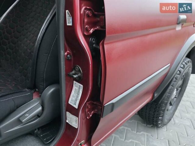 Красный Мицубиси Паджеро Спорт, объемом двигателя 3 л и пробегом 155 тыс. км за 5777 $, фото 45 на Automoto.ua