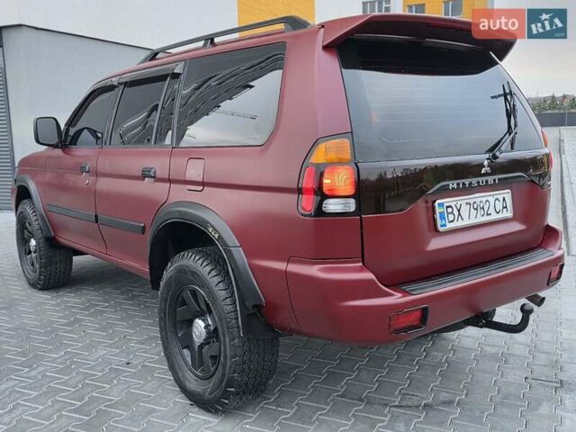 Красный Мицубиси Паджеро Спорт, объемом двигателя 3 л и пробегом 155 тыс. км за 5777 $, фото 8 на Automoto.ua