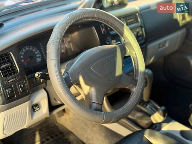 Червоний Міцубісі Паджеро Спорт, об'ємом двигуна 2.97 л та пробігом 212 тис. км за 6999 $, фото 7 на Automoto.ua