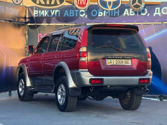 Червоний Міцубісі Паджеро Спорт, об'ємом двигуна 3 л та пробігом 212 тис. км за 6999 $, фото 6 на Automoto.ua