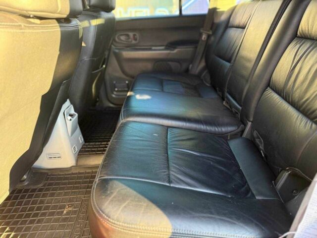 Червоний Міцубісі Паджеро Спорт, об'ємом двигуна 3 л та пробігом 212 тис. км за 6999 $, фото 8 на Automoto.ua