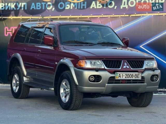 Червоний Міцубісі Паджеро Спорт, об'ємом двигуна 2.97 л та пробігом 212 тис. км за 6999 $, фото 3 на Automoto.ua
