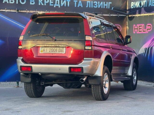 Червоний Міцубісі Паджеро Спорт, об'ємом двигуна 3 л та пробігом 212 тис. км за 6999 $, фото 5 на Automoto.ua
