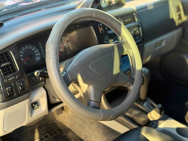 Червоний Міцубісі Паджеро Спорт, об'ємом двигуна 3 л та пробігом 212 тис. км за 6999 $, фото 7 на Automoto.ua