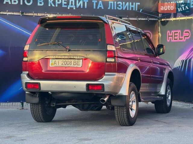 Червоний Міцубісі Паджеро Спорт, об'ємом двигуна 2.97 л та пробігом 212 тис. км за 6999 $, фото 5 на Automoto.ua