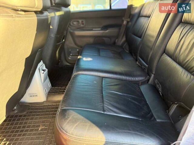 Червоний Міцубісі Паджеро Спорт, об'ємом двигуна 2.97 л та пробігом 212 тис. км за 6999 $, фото 8 на Automoto.ua