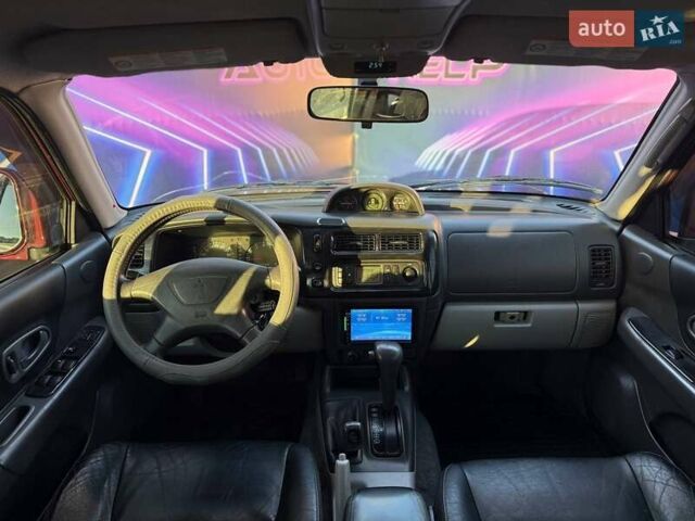 Червоний Міцубісі Паджеро Спорт, об'ємом двигуна 2.97 л та пробігом 212 тис. км за 6999 $, фото 9 на Automoto.ua