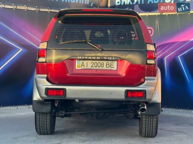 Червоний Міцубісі Паджеро Спорт, об'ємом двигуна 2.97 л та пробігом 212 тис. км за 6999 $, фото 4 на Automoto.ua
