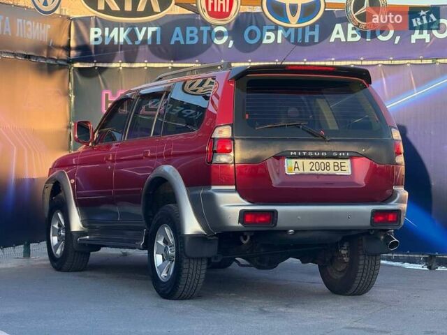 Червоний Міцубісі Паджеро Спорт, об'ємом двигуна 2.97 л та пробігом 212 тис. км за 6999 $, фото 6 на Automoto.ua