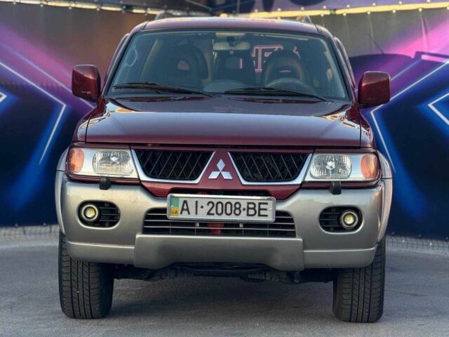 Червоний Міцубісі Паджеро Спорт, об'ємом двигуна 3 л та пробігом 212 тис. км за 6999 $, фото 2 на Automoto.ua