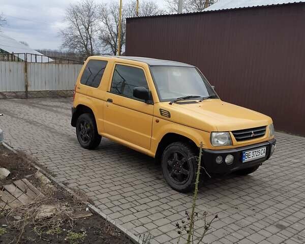 Желтый Мицубиси Паджеро Спорт, объемом двигателя 0.6 л и пробегом 150 тыс. км за 3200 $, фото 14 на Automoto.ua